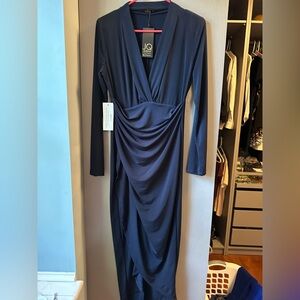 Long sleeve navy jersey dress.